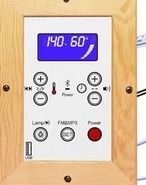 Digital sauna keypad controller in a wood frame showing temperature and timer controls